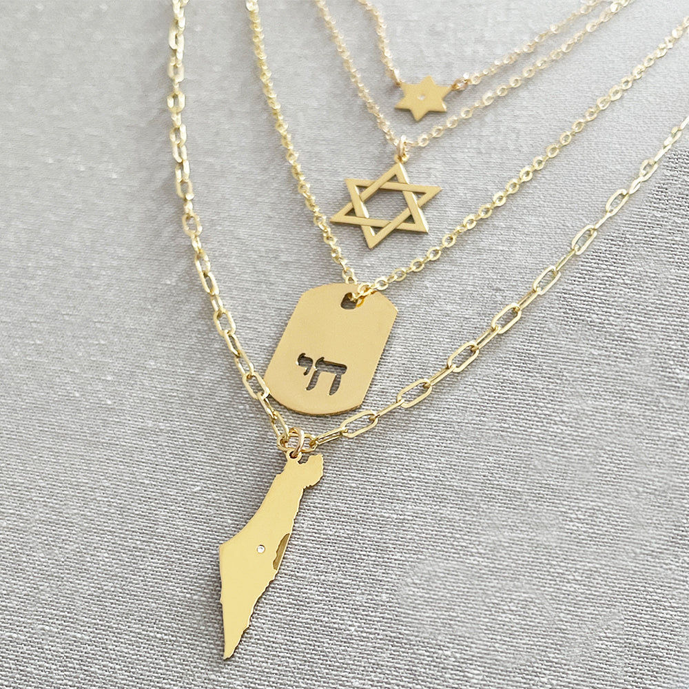 Close-up of Chai Tag pendant necklace