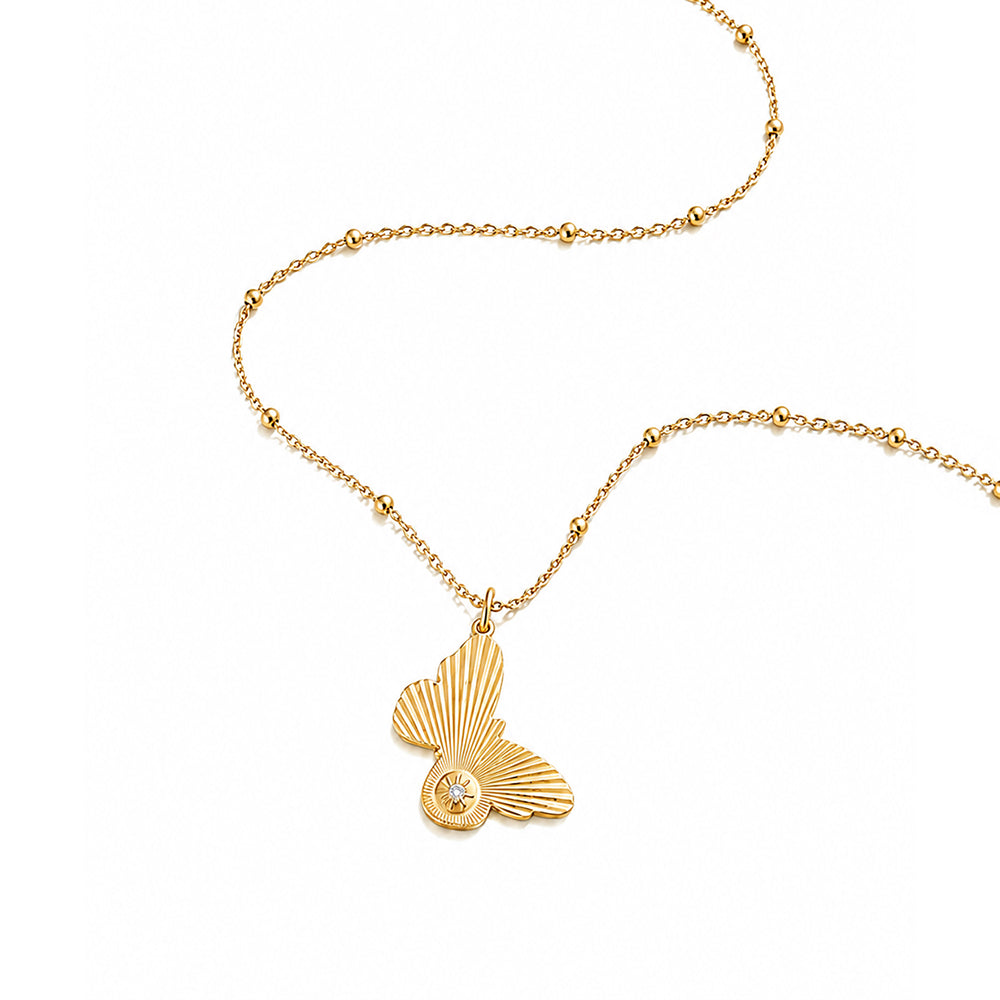 Sima Diamond Butterfly Medallion Necklace featuring a butterfly pendant with a diamond accent