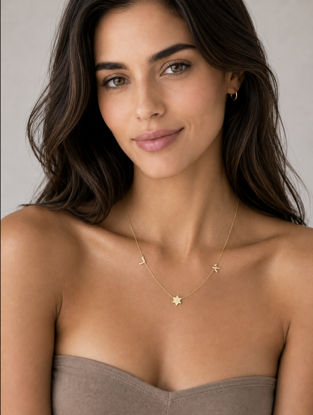 Woman wearing a personalized Star of David diamond necklace